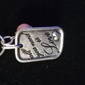 Silvertone necklace with pendent